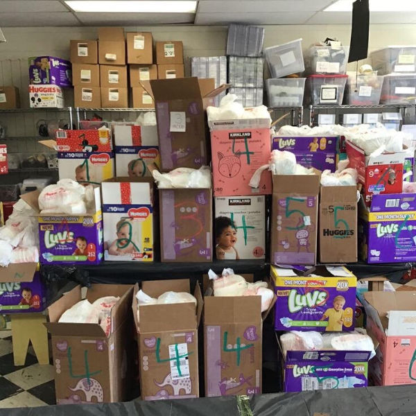 boxes of diapers on tables