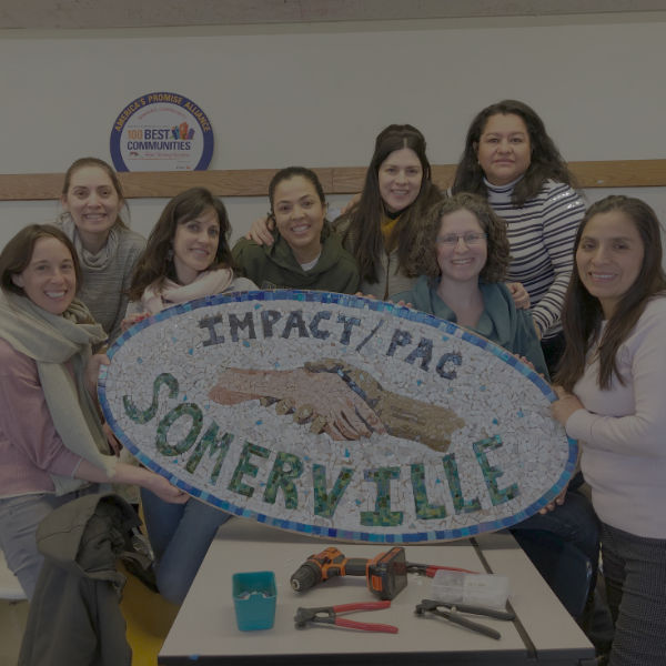 group of women sharing group mosaic sign