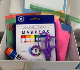 markers and supplies in a treasure box