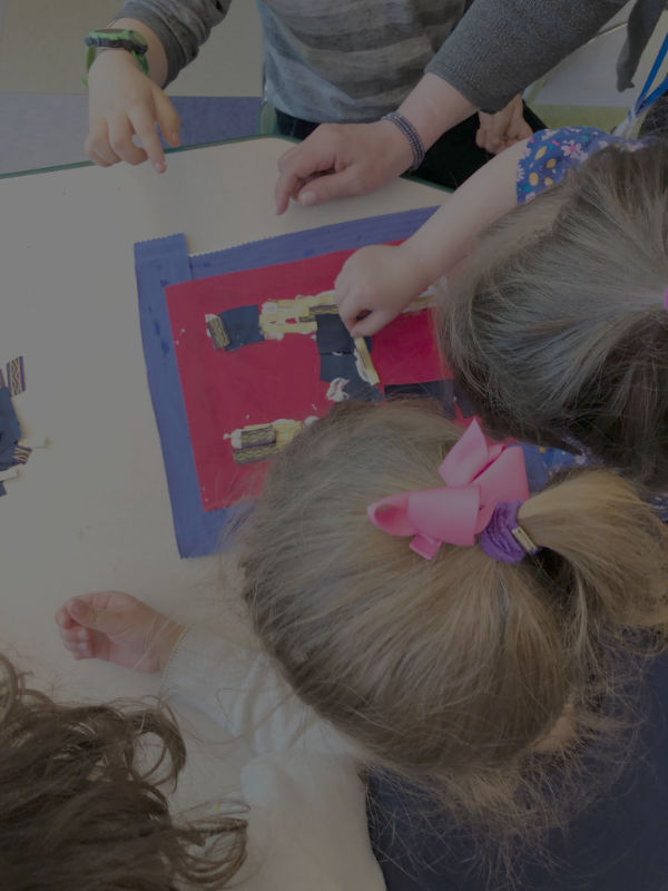 Children put together a letter for the quilt