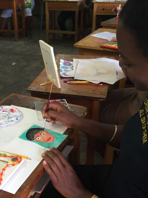 woman painting a face